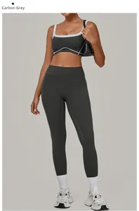 Detail des anthrazitfarbenen Yoga-Sets mit Kontrastpaspeln und Racerback-Design