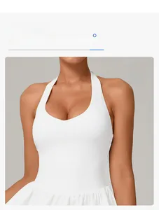 Detail of white halter neck sports dress showing V-neck design and elastic wrap fit