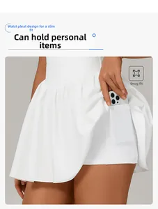 Detailed view of white tennis skirt with side pocket for smartphone and high waist pleats