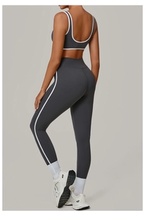 Detail view of the high-waist yoga leggings and back design with white contrast trim