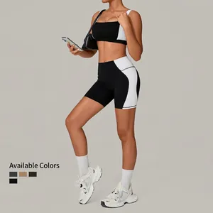 Women's backless yoga set with black and white colorblock sports bra and high-waist shorts