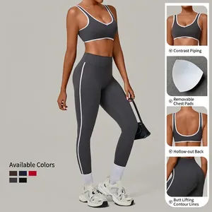 Contrast piping yoga set with racerback top and high waist leggings in dark grey