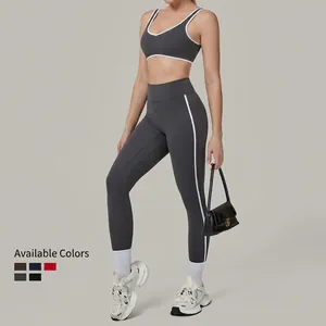 Two-piece yoga set with sports bra and high-waisted leggings in dark gray contrast trim