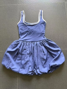 Purple backless tennis dress with white piping and voluminous bubble hem detail