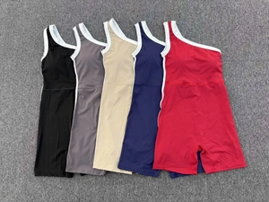 Combinaisons de yoga asymétriques cinq couleurs avec bordures contrastées et pads