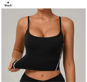 Detail showing high-stretch black sports camisole with white side stripes and thin straps