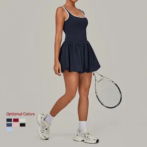 Contrast trim backless tennis dress with pleated hem and built-in shorts for sports