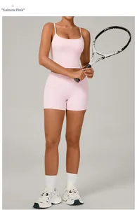 Close-up of sakura pink yoga set showing breathable high-stretch knitted fabric texture