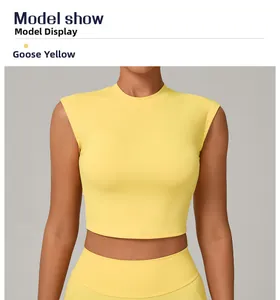 Close-up of goose yellow crop top yoga vest featuring high neck and sleeveless design