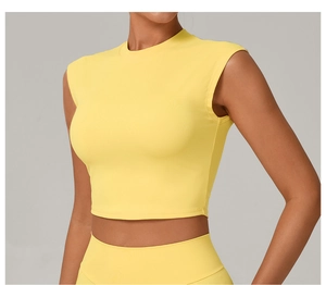 Detailed texture of vibrant yellow slim fit short yoga crop top for women sports wear