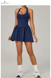 Macro shot of midnight blue tennis dress featuring high-stretch fabric and pleated skirt