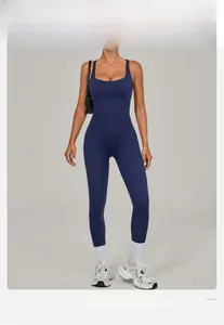 Detail view of navy blue yoga bodysuit featuring square neck and slim fit athletic fabric