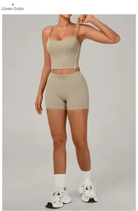 Detail view of linen yoga set with ribbed waist shorts and thin strap sports tank top