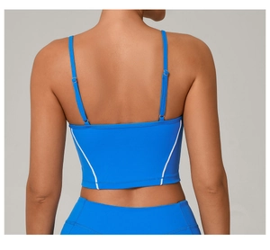 Detail of adjustable double straps and white contrast stitching on blue yoga vest