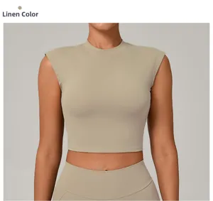 Close-up of linen-colored slim-fit yoga tank top with standing collar and matte texture