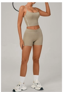 Detailed view of women's athletic two-piece set with a cami top and high-waist shorts