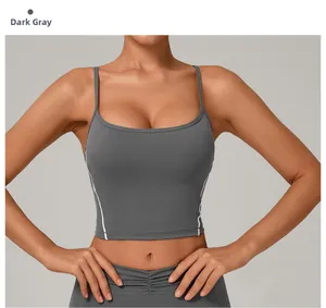 Front view of dark gray yoga vest showing slim fit design and white side stripes
