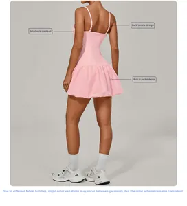 Detail of pink tennis dress featuring removable pads, back buckle, and inner pockets