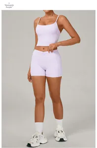 Romantic purple two-piece yoga set featuring a strappy sports bra and high-waist biker shorts
