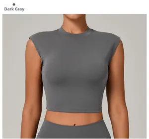 Detail of dark grey tight fit quick-dry yoga crop top showing shoulder cut design