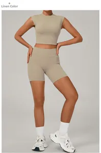Detail view of linen yoga set showing sleek cropped tank top and high waist biker shorts