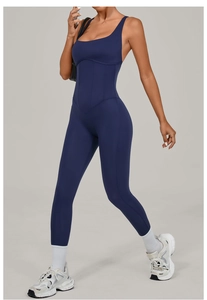 Detail of navy blue slimming yoga bodysuit with adjustable straps and contour stitching