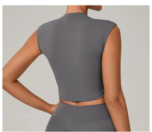Back view of a slim fit dark grey mock neck sleeveless yoga top for women fitness