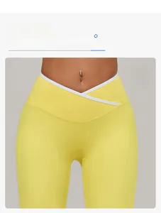 Detail of high-waist yoga pants featuring contrast V-shaped cross waistband design