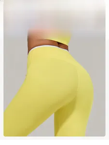 Close-up of bright yellow yoga leggings showing push-up effect and sculpting seams