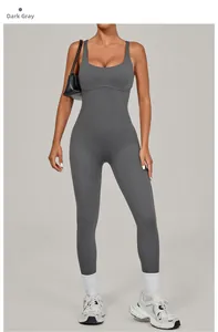 Detail view of dark grey athletic yoga bodysuit with supportive seams and U-neckline