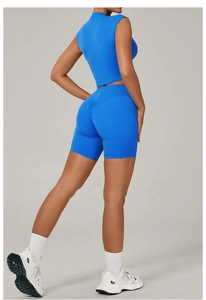 Detail view of electric blue yoga set showing scrunch butt high waist cycling shorts