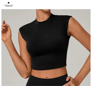 Close-up of slim fit black quick-dry athletic crop top for yoga and fitness training