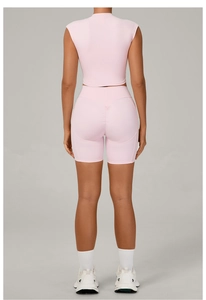Rear view of pink yoga set with high-waist scrunch butt lifting fitness shorts