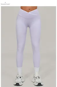 Detail view of the V-shape crossover high waistband on lavender purple yoga leggings