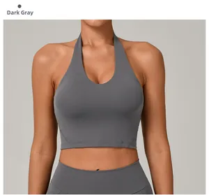 Dettaglio del reggiseno sportivo allacciato al collo grigio scuro con fascia elastica
