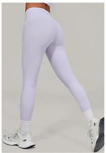 Detailed back view of high waist lavender yoga pants showing seamless push up fit