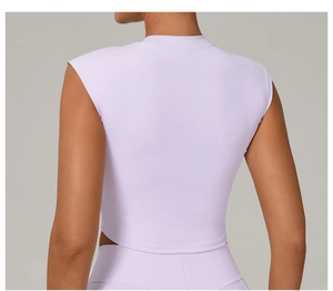 Rear view of lavender slim fit yoga crop top with high neck and matching leggings