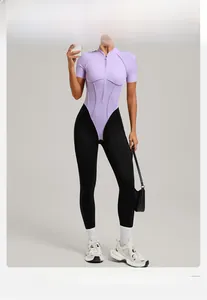 Macro detail of lavender stand collar and front zipper on long sleeve yoga bodysuit
