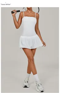 Detail view of Swan White sleeveless pleated golf dress with professional tennis racket