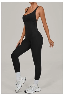 Detailed side view of black yoga bodysuit with adjustable thin straps and slim fit design