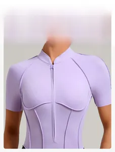 Detail of light purple sports bodysuit with half-zipper and short sleeves design
