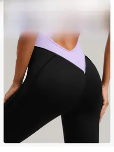 Detail showing the purple and black V-shaped color block waist on the back of the fitness bodysuit