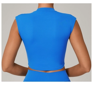 Back view of a bright blue slim fit quick-dry yoga crop top with a racerback design