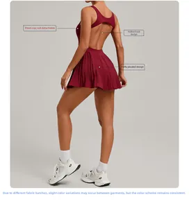 Detail view of burgundy backless sports dress showing built-in cups and pleated hemline