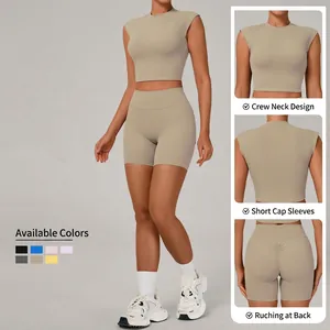 Women's athletic yoga set with seamless high waist scrunch shorts and cropped tank top