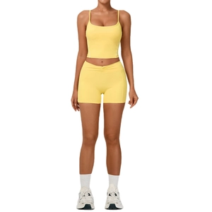 Women's lemon yellow yoga set with high waist shorts and slim fit sports top