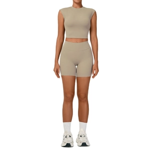 Women's 2-piece yoga set with khaki cropped tank top and high waisted sports shorts
