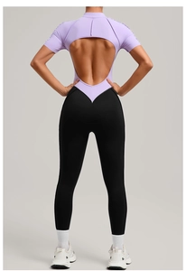 Detail of lavender high-neck athletic bodysuit with back cutout and high-waist black leggings
