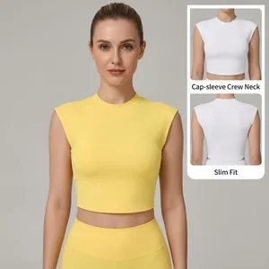Yellow slim-fit yoga crop top with cap sleeves and high-stretch quick-dry fabric