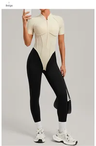 Detail of beige short sleeve fitness bodysuit with front zipper and structural seams